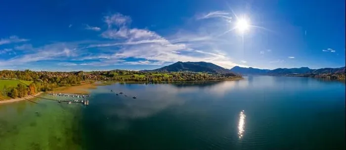 Framed Print : Fantastic panoramic view over the bavarian lake Tegernsee in autumn with fall colors, made by a drone Framed Print : Fantastic panoramic view over the bavarian lake Tegernsee in autumn with fall colors, made by a drone