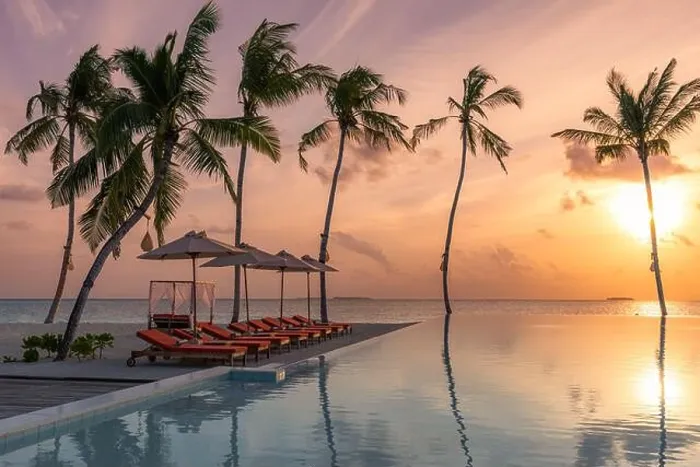 Framed Print : Fantastic poolside, sunset sky, palm trees reflection. Luxury tropical beach landscape, infinity swimming pool, deck chairs bed under umbrellas Framed Print : Fantastic poolside, sunset sky, palm trees reflection. Luxury tropical beach landscape, infinity swimming pool, deck chairs bed under umbrellas