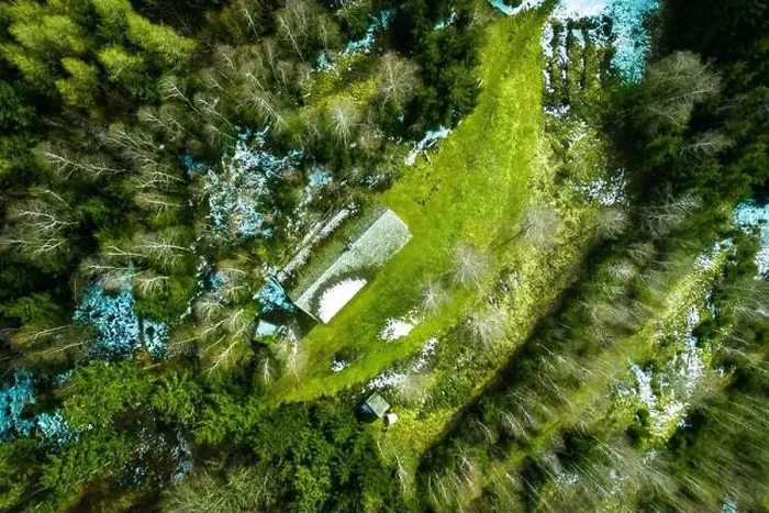 Framed Print : Fantastic, scenic drone view of an alpine hut with associated pasture surrounded by bare birch trees in a mixed forest Framed Print : Fantastic, scenic drone view of an alpine hut with associated pasture surrounded by bare birch trees in a mixed forest