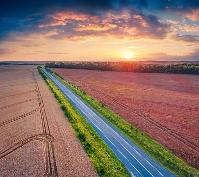 Framed Print : Fantastic sunrise on Ukrainian countrysidewith asphalt road among the field of wheat Framed Print : Fantastic sunrise on Ukrainian countrysidewith asphalt road among the field of wheat
