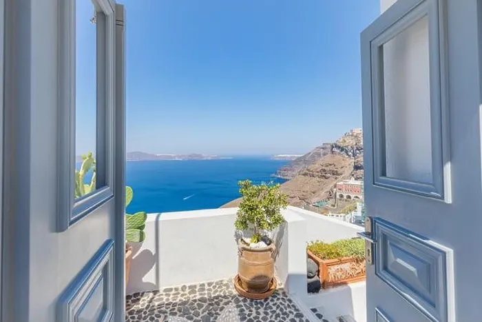 Framed Print : Fantastic travel panorama, Santorini urban street landscape. Door or gate stairs and white architecture under sunny sky. Amazing summer vacation Framed Print : Fantastic travel panorama, Santorini urban street landscape. Door or gate stairs and white architecture under sunny sky. Amazing summer vacation