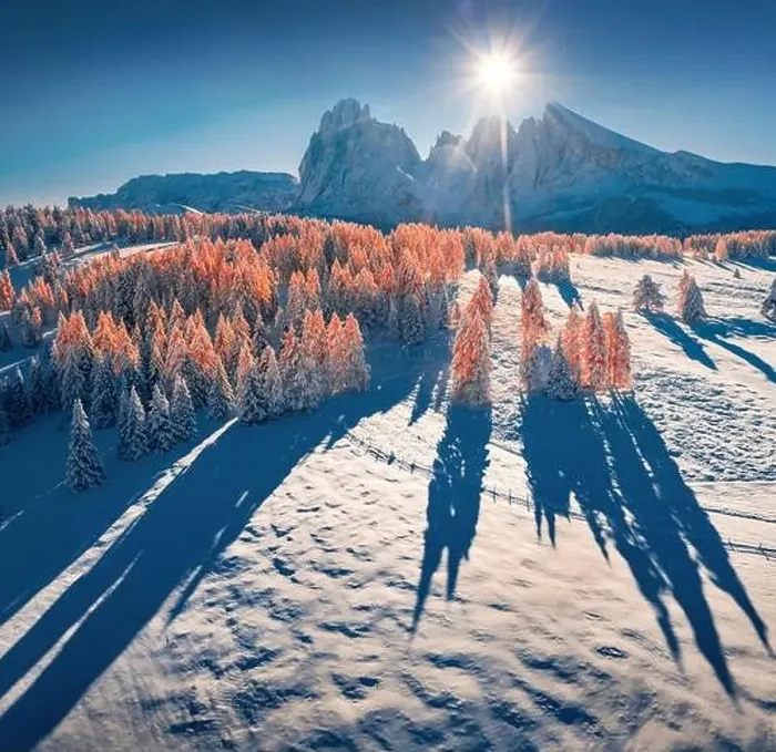 Framed Print : Fantastic view from flying drone of Alpe di Siusi village with Plattkofel peak on background