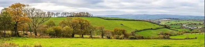 Framed Print : Farmlands, Meadows and Fields over Devon in the colors of fall, England, Europe Framed Print : Farmlands, Meadows and Fields over Devon in the colors of fall, England, Europe