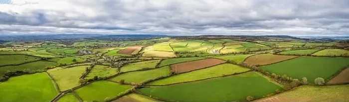 Framed Print : Farmlands, Meadows and Fields over Devon in the colors of fall, England, Europe Framed Print : Farmlands, Meadows and Fields over Devon in the colors of fall, England, Europe