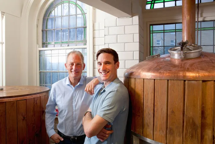 Framed Print : Father and son in brewery Framed Print : Father and son in brewery