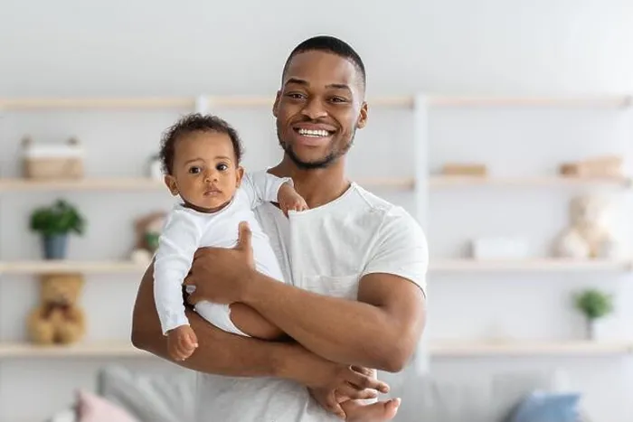 Framed Print : Fatherhood. Portrait Of Happy Young Black Man Holding His Adorable Infant Baby Framed Print : Fatherhood. Portrait Of Happy Young Black Man Holding His Adorable Infant Baby