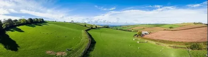 Framed Print : Fields and Farmlands over Labrador Bay, Devon, England
