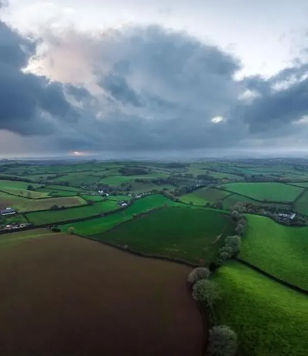 Framed Print : Fields and Farms over Cockington from a drone, Paignton, Torquay, Devon, England Framed Print : Fields and Farms over Cockington from a drone, Paignton, Torquay, Devon, England