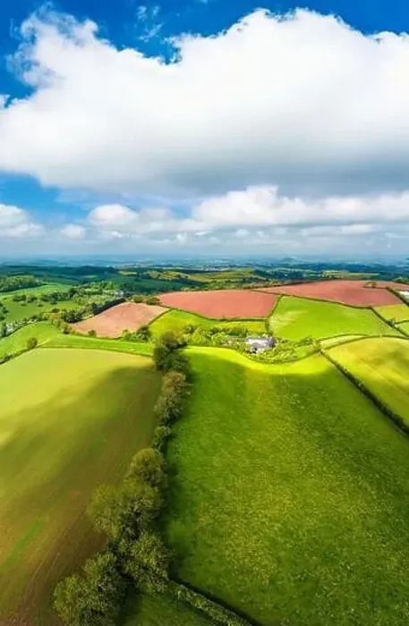 Framed Print : Fields and farms from a drone, Torquay, Devon, England Framed Print : Fields and farms from a drone, Torquay, Devon, England