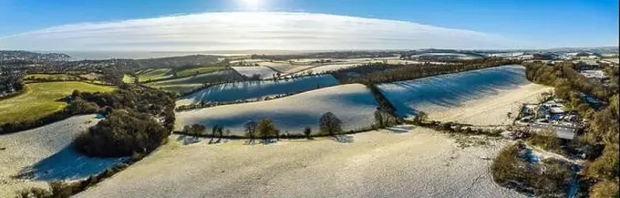 Framed Print : Fields and Farms shrouded in frost from a drone, Torquay, Devon, England Framed Print : Fields and Farms shrouded in frost from a drone, Torquay, Devon, England