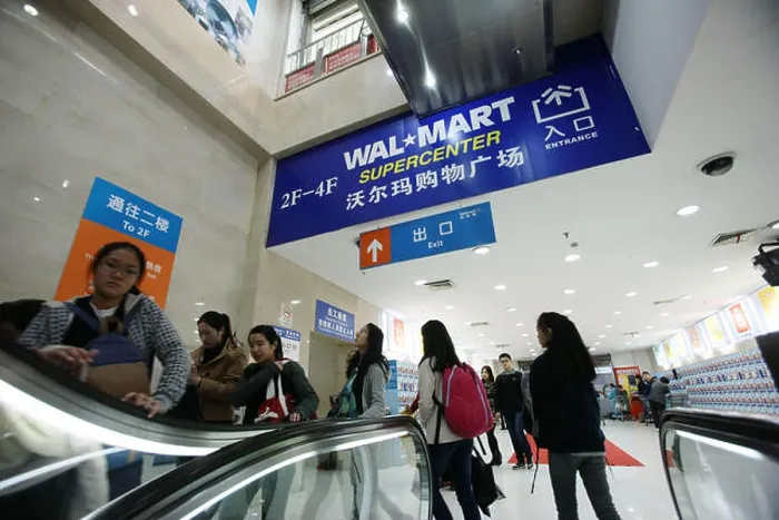 Framed Print : FILE--Chinese customers go shopping at a Wal-Mart Supercenter in Shanghai Framed Print : FILE--Chinese customers go shopping at a Wal-Mart Supercenter in Shanghai