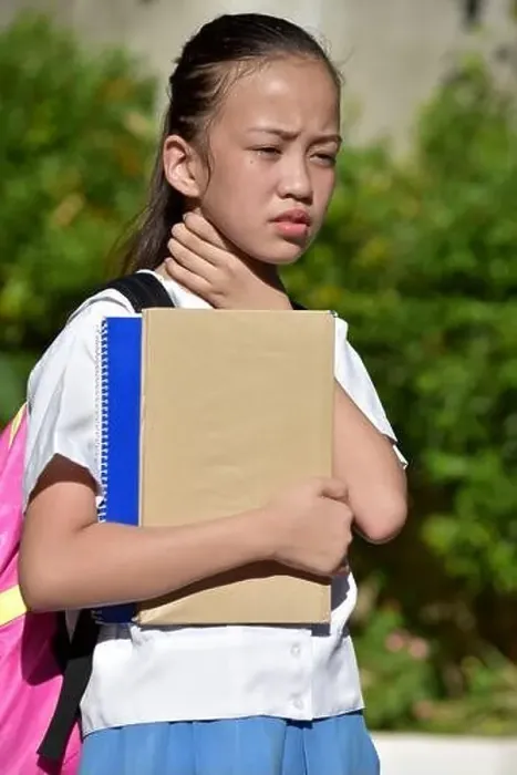 Framed Print : Filipina Girl Student With Sore Throat Framed Print : Filipina Girl Student With Sore Throat