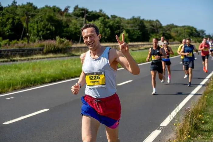 Framed Print : Filippo Fontanelli, runner no. 1226, waves to the camera while competing in the 2025 Scottish Half Marathon in Scotland Framed Print : Filippo Fontanelli, runner no. 1226, waves to the camera while competing in the 2025 Scottish Half Marathon in Scotland