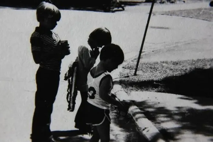 Framed Print : Fine 70s vintage black and white lifestyle photography of kids hanging out with each and having togetherness Framed Print : Fine 70s vintage black and white lifestyle photography of kids hanging out with each and having togetherness