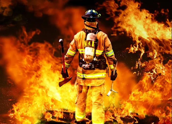 Framed Print : Firefighter searching, fireman accessing a fire Framed Print : Firefighter searching, fireman accessing a fire