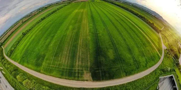 Framed Print : Fish eye Aerial shot from a drone of young green wheat in Spring Framed Print : Fish eye Aerial shot from a drone of young green wheat in Spring