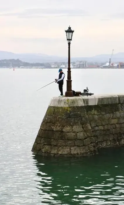 Framed Print : Fisherman using rod Framed Print : Fisherman using rod