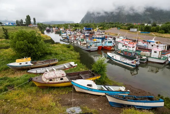 Framed Print : Fishing boats on the Aysen River at Puerto Aysen near Castro, Chile, South America Framed Print : Fishing boats on the Aysen River at Puerto Aysen near Castro, Chile, South America