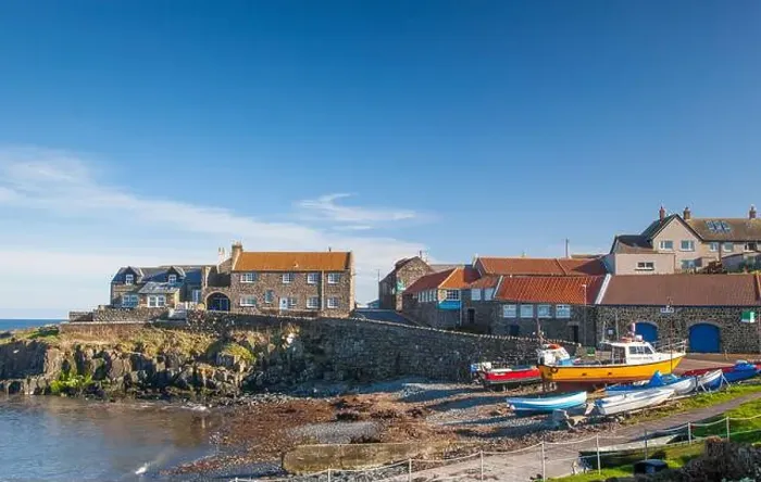 Framed Print : Fishing boats on the shore at Craster harbour, Northumberland UK Framed Print : Fishing boats on the shore at Craster harbour, Northumberland UK