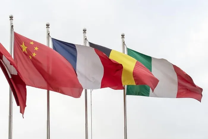 Framed Print : Flags of Italy, Germany, France, China and Switzerland flying from poles
