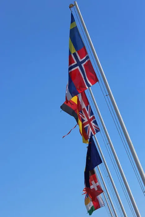 Framed Print : many flags of many nations world waving in the blue sky Framed Print : many flags of many nations world waving in the blue sky