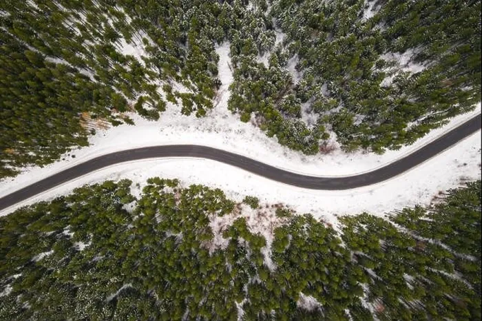 Framed Print : Flight over the winter mountains with road serpentine and snowy forest. Top down view. Landscape photography Framed Print : Flight over the winter mountains with road serpentine and snowy forest. Top down view. Landscape photography