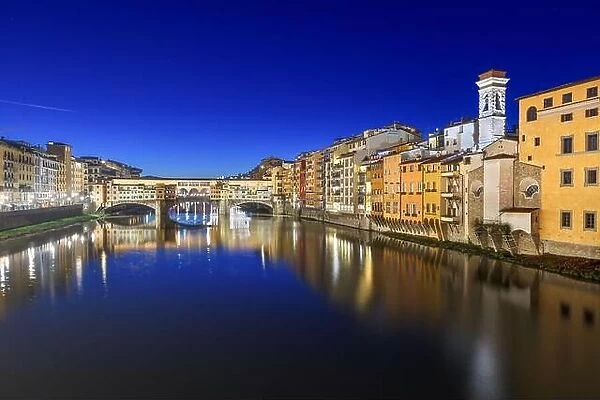 Florence, Italy at the Ponte Vecchio Bridge crossing the Arno River at twilight