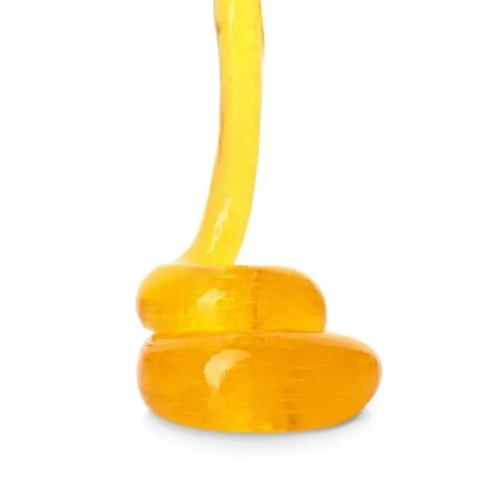 Framed Print : Flowing orange slime on white background. Antistress toy Framed Print : Flowing orange slime on white background. Antistress toy