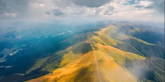 Framed Print : Flying under the clouds. Panoramic summer view from flying drone of Krasna range with old country road Framed Print : Flying under the clouds. Panoramic summer view from flying drone of Krasna range with old country road