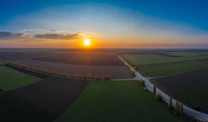 Framed Print : Flying over a field of growing wheat. Aerial panoramic drone shot Framed Print : Flying over a field of growing wheat. Aerial panoramic drone shot