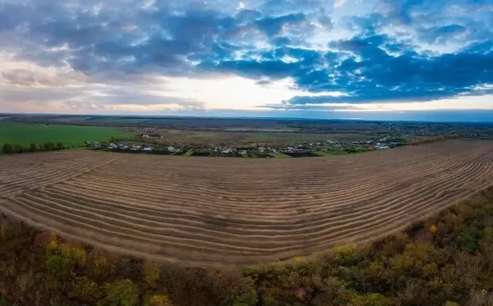Framed Print : Flying over a field of growing wheat. Aerial panoramic drone shot Framed Print : Flying over a field of growing wheat. Aerial panoramic drone shot