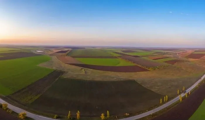 Framed Print : Flying over a field of growing wheat. Aerial panoramic drone shot Framed Print : Flying over a field of growing wheat. Aerial panoramic drone shot