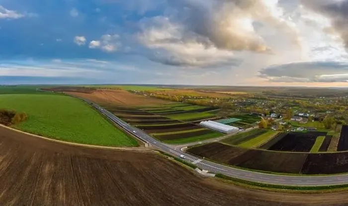 Framed Print : Flying over a field of growing wheat. Aerial panoramic drone shot Framed Print : Flying over a field of growing wheat. Aerial panoramic drone shot