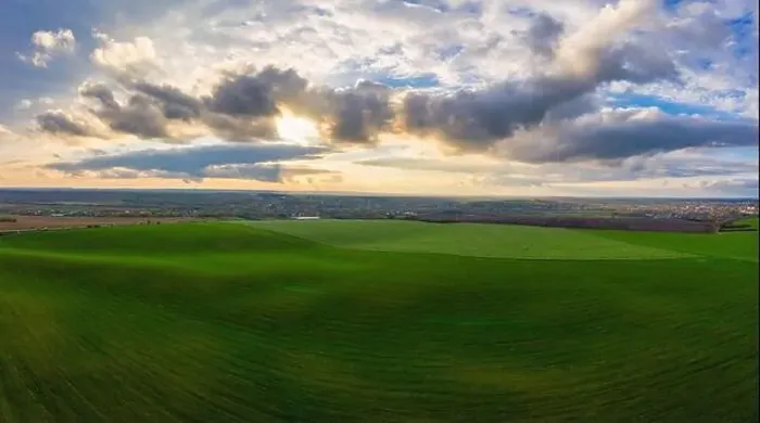 Framed Print : Flying over a field of growing wheat. Aerial panoramic drone shot Framed Print : Flying over a field of growing wheat. Aerial panoramic drone shot