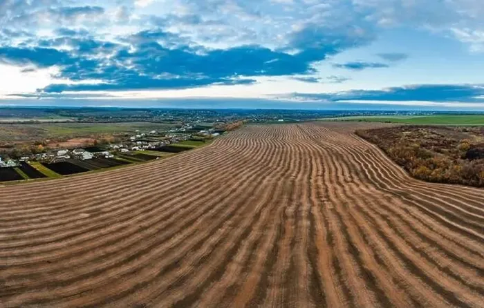 Framed Print : Flying over a field of growing wheat. Aerial panoramic drone shot Framed Print : Flying over a field of growing wheat. Aerial panoramic drone shot