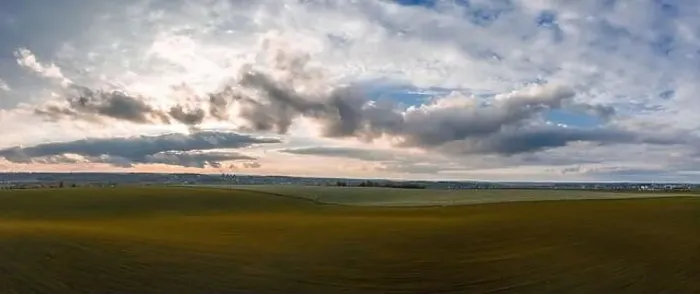 Framed Print : Flying over a field of growing wheat. Aerial panoramic drone shot Framed Print : Flying over a field of growing wheat. Aerial panoramic drone shot