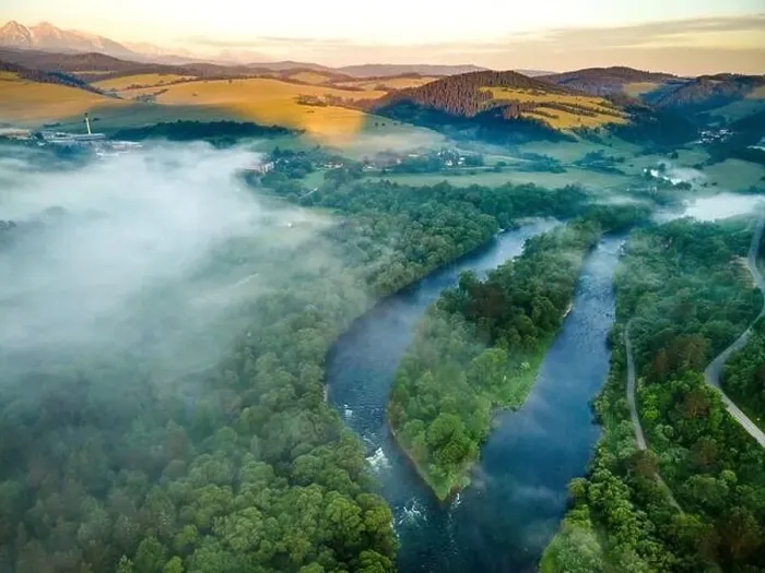 Framed Print : Fog and Mist at Sunrise Over Dunajec River in Pieniny, Poland. Aerial Drone View Framed Print : Fog and Mist at Sunrise Over Dunajec River in Pieniny, Poland. Aerial Drone View