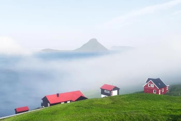 Framed Print : Foggy morning view of a houses with red roof in the Velbastadur village on Streymoy island, Faroe islands, Denmark. Landscape photography Framed Print : Foggy morning view of a houses with red roof in the Velbastadur village on Streymoy island, Faroe islands, Denmark. Landscape photography