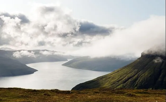 Framed Print : Foggy mountain peaks and clouds covering sea and mountains. Panoramical view from famous place - Sornfelli on Streymoy island, Faroe islands Framed Print : Foggy mountain peaks and clouds covering sea and mountains. Panoramical view from famous place - Sornfelli on Streymoy island, Faroe islands