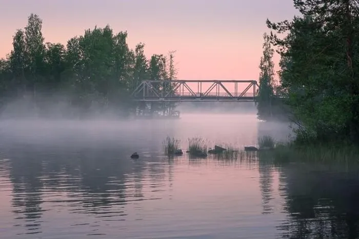 Framed Print : Foggy summer landscape and old iron bridge with beautiful calm lake at summer night in Finland Framed Print : Foggy summer landscape and old iron bridge with beautiful calm lake at summer night in Finland