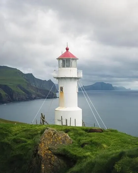 Framed Print : Foggy view of old lighthouse on the Mykines island, Faroe islands, Denmark. Landscape photography Framed Print : Foggy view of old lighthouse on the Mykines island, Faroe islands, Denmark. Landscape photography