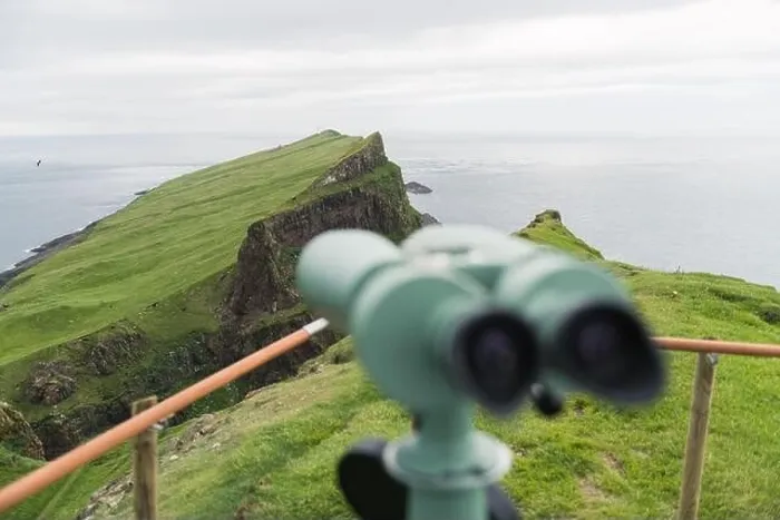 Framed Print : Foggy view of old lighthouse from viewpoint with tourist binoculars on the Mykines island, Faroe islands, Denmark. Landscape photography Framed Print : Foggy view of old lighthouse from viewpoint with tourist binoculars on the Mykines island, Faroe islands, Denmark. Landscape photography
