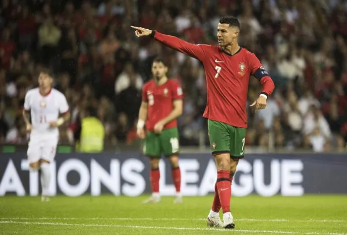 Framed Print : Football match, captain Cristiano RONALDO CR7 Portugal points angrily with his left arm and index finger to the left Framed Print : Football match, captain Cristiano RONALDO CR7 Portugal points angrily with his left arm and index finger to the left