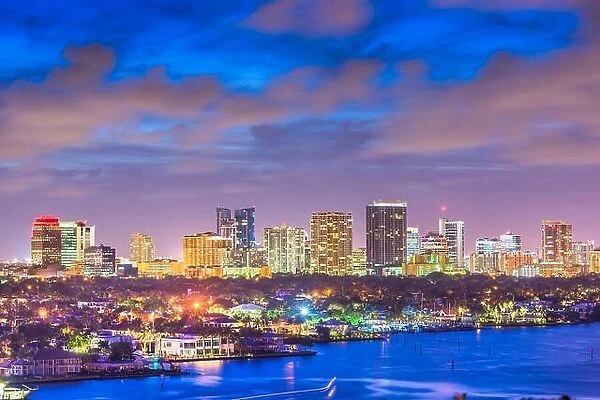 Fort Lauderdale, Florida, USA skyline and river at dusk