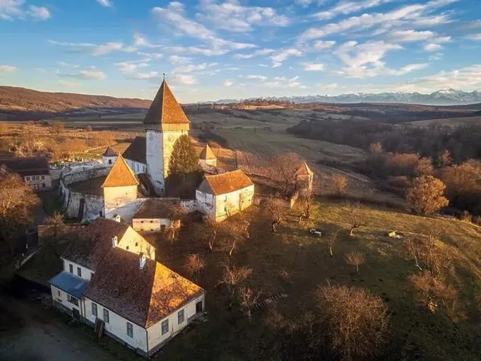 Framed Print : The fortified church of Hosman at sunset golden hour Framed Print : The fortified church of Hosman at sunset golden hour
