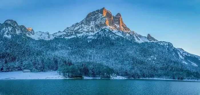 Framed Print : France, Pyrenees Atlantiques, Bearn, Ossau valley, snowy landscape, fir forest and Pic du Midi d'Ossau at sunset Framed Print : France, Pyrenees Atlantiques, Bearn, Ossau valley, snowy landscape, fir forest and Pic du Midi d'Ossau at sunset
