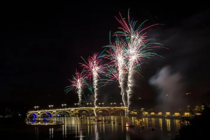 Framed Print : France - Toulouse - Pont Neuf - pale bouquets rise above glowing arches, smoke drifting over the river Framed Print : France - Toulouse - Pont Neuf - pale bouquets rise above glowing arches, smoke drifting over the river