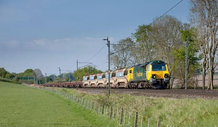 Framed Print : Freightliner GE class 70 diesel locomotive 70016 on the electrified west coast mainline with a freight train carrying Framed Print : Freightliner GE class 70 diesel locomotive 70016 on the electrified west coast mainline with a freight train carrying