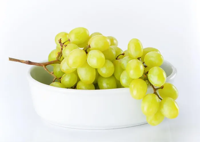 Framed Print : Fresh green grapes in white bowl on white Framed Print : Fresh green grapes in white bowl on white