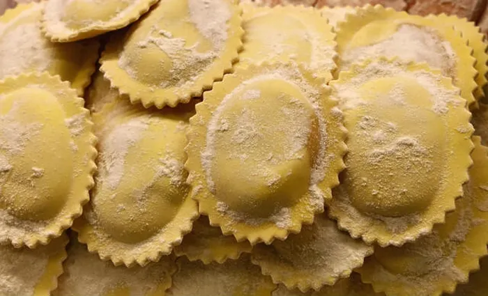 Framed Print : Fresh traditional homemade rustic artisan gourmet Italian ravioli stuffed pasta in retail display Framed Print : Fresh traditional homemade rustic artisan gourmet Italian ravioli stuffed pasta in retail display